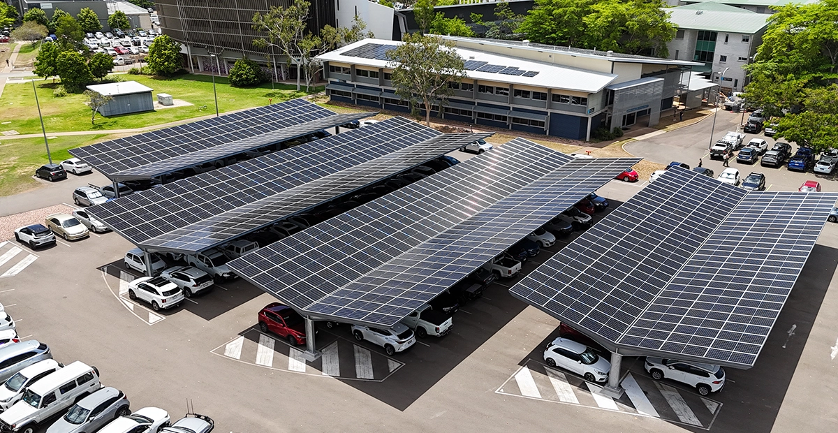 An aerial view od four CSE Linked EcoPort carpark structures with cars parked underneath